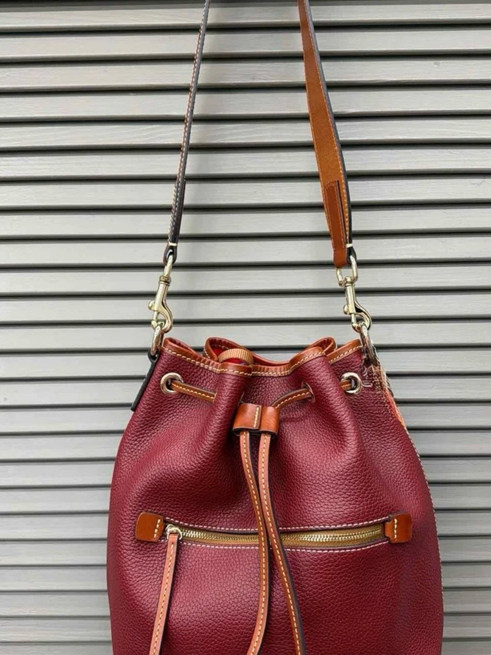 Dooney & Bourke Burgundy Drawstring Bucket Bag with Tan Trim